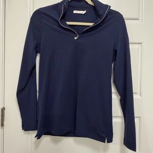 Peter Millar Navy Long Sleeve Top with Team TaylorMade logo on sleeve